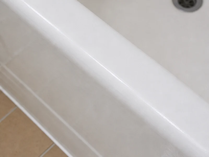 Repaired and refinished tub rim with chips and rust gone in a Santa Clara home